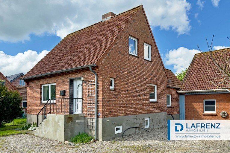 Titelbild Fehmarn Einfamilienhaus Inselklassiker in der N�he des S�dstrands mit sonnigem Garten.