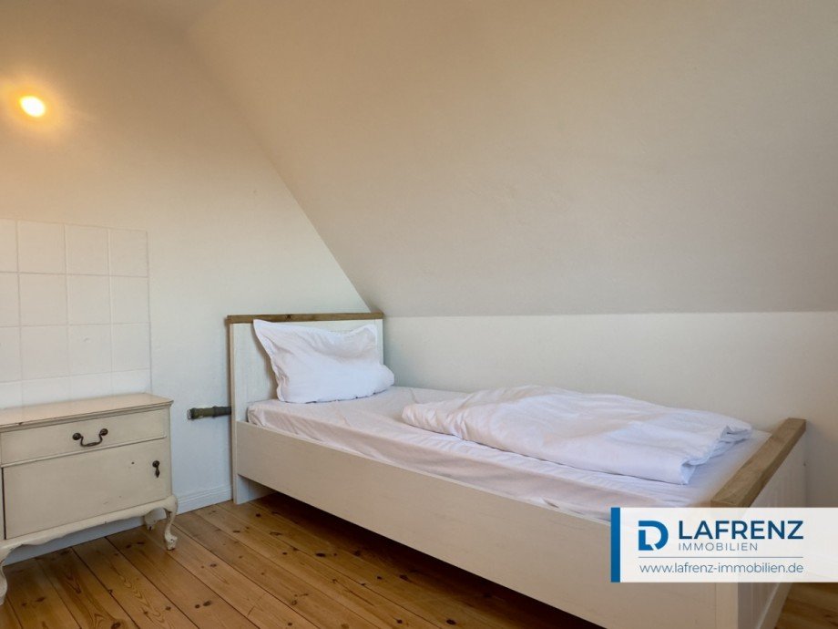 kleines Schlafzimmer im Dachgeschoss Einfamilienhaus Fehmarn