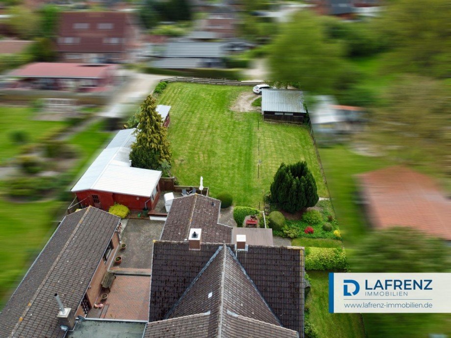 r�ckw�rtiger-Grundst�cksbereich Einfamilienhaus Schashagen