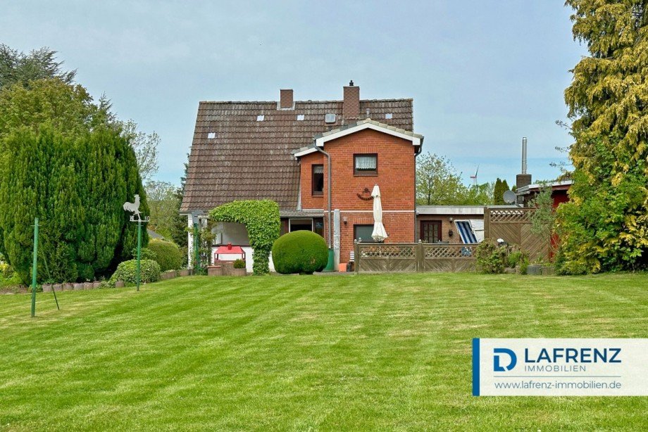 Ansicht-aus-dem-Garten Einfamilienhaus Schashagen