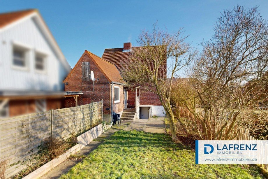 Ansicht-aus-dem-Garten Einfamilienhaus Fehmarn