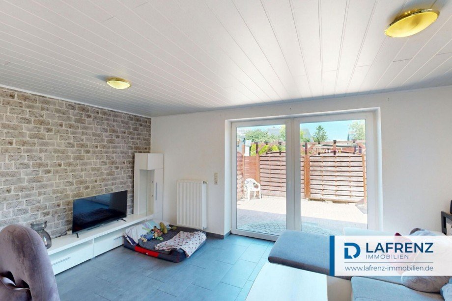 Wohnzimmer-im-Anbau Zweifamilienhaus Fehmarn