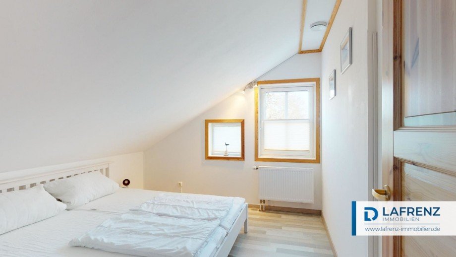 Wohnung im Dachgeschoss Schlafzimmer Mehrfamilienhaus Fehmarn