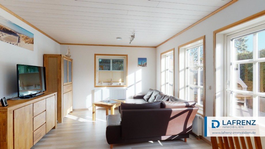 Wohnung im Erdgeschoss Wohnzimmer Ansicht 2 Mehrfamilienhaus Fehmarn
