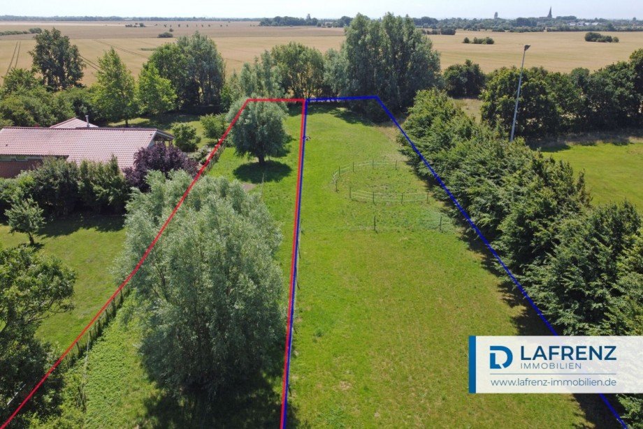 Weidefl�che rot (blau m�gliches Pachtland) Einfamilienhaus Fehmarn