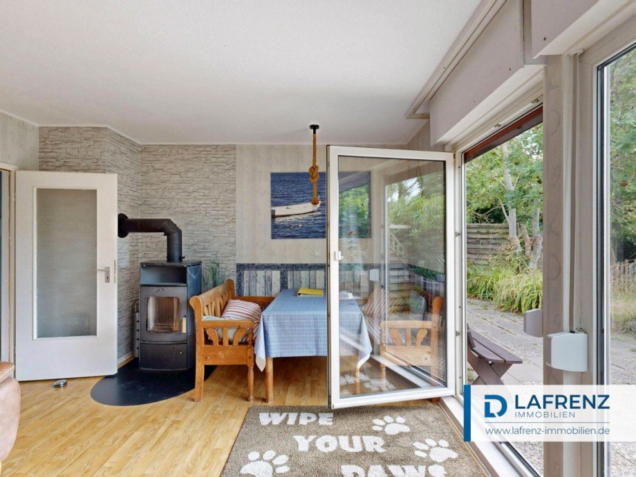 Wohnzimmer und �bergang Terrasse Bungalow Fehmarn