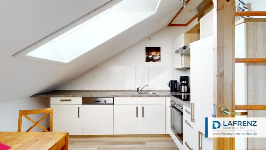 Wohnung im Dachgeschoss K�che Mehrfamilienhaus Fehmarn