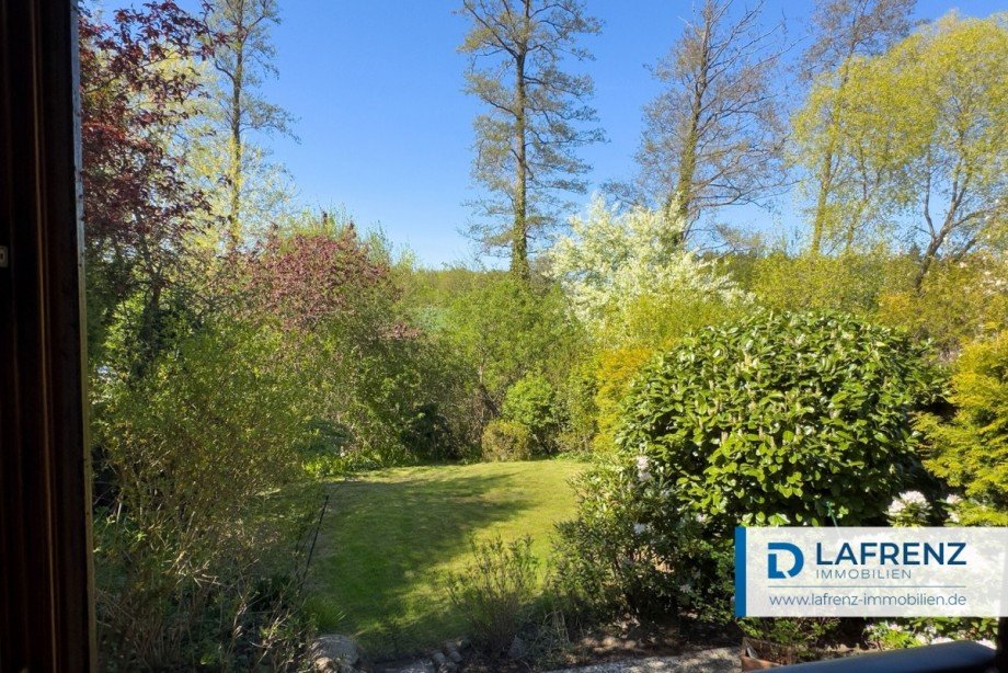 Gartenblick-aus-dem-Wohnzimmer Doppelhaush�lfte Klein Wesenberg