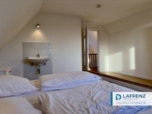 Schlafzimmer im Dachgeschoss Inselklassiker in der N�he des S�dstrands mit sonnigem Garten.