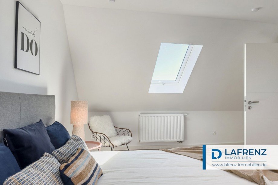 Schlafzimmer-im-Dachgeschoss-2 Reihenendhaus Fehmarn